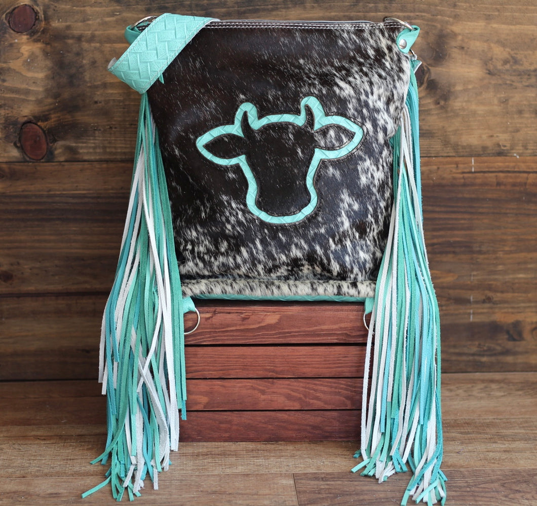 Turquoise Cow Cut Backpack Crossover
