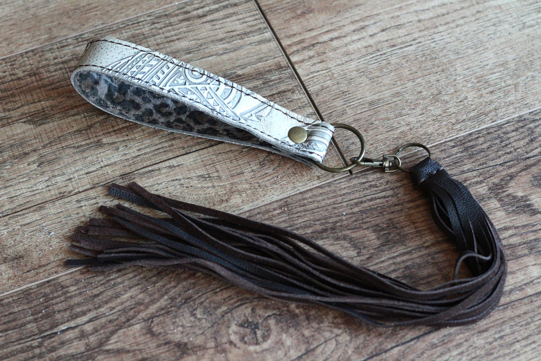 White feathers and gray leopard Cowgirl Keychain