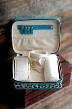 Load image into Gallery viewer, Turquoise Bill/White Cowhide Medium Jewelry Case
